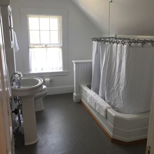 A full bath with new (old-fashioned) fixtures